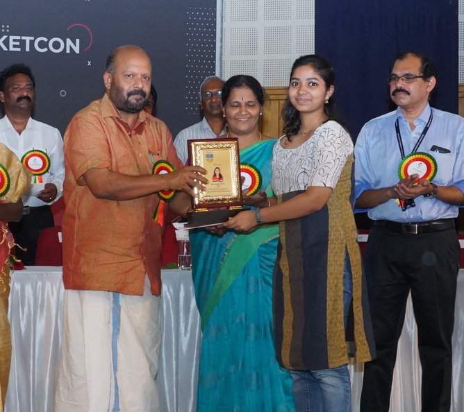 Ms Nandhini Menon CSE Branch is being honoured as the KTU OUTSTANDING PLAYER OF THE YEAR by Mr Sunil Kurmar, Minister for Agriculture Govt of Kerala at Thrissur. KTU OUTSTANDING PLAYER OF THE YEAR